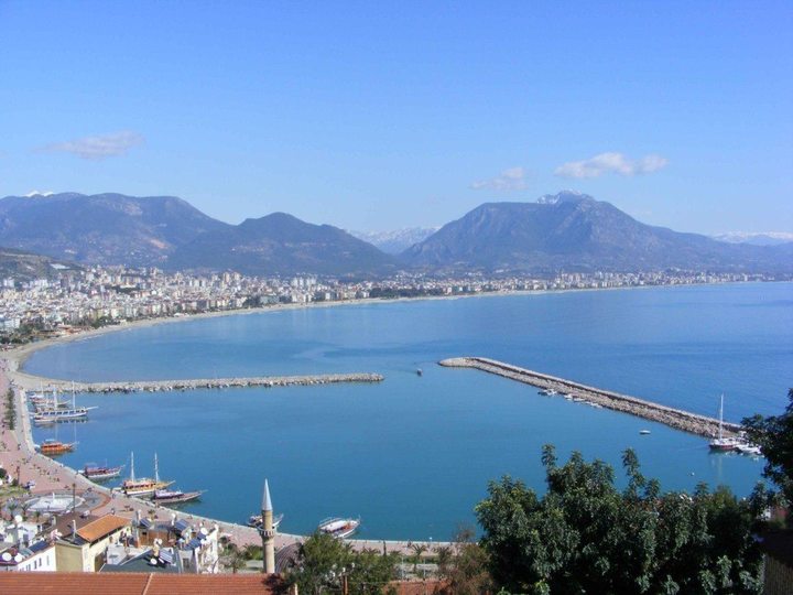 Alanya harbour and Tarus mountains in the backdrop