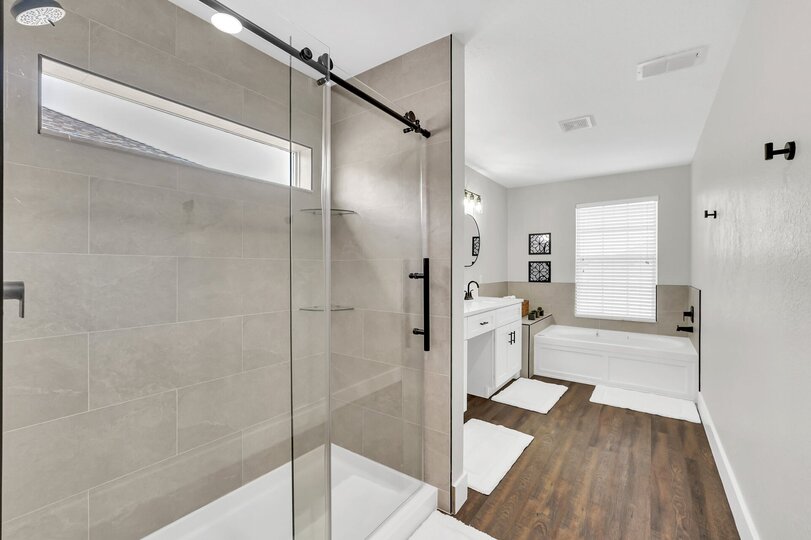 Master bath with walkin shower and soaking tub