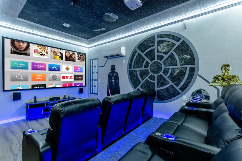 Watch a movie in the comfortable theater seating