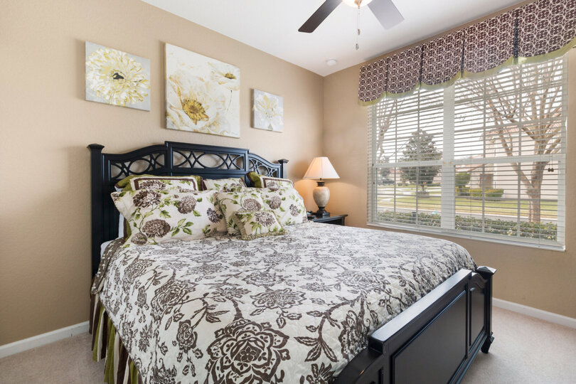 A king bedroom located by the entrance of home