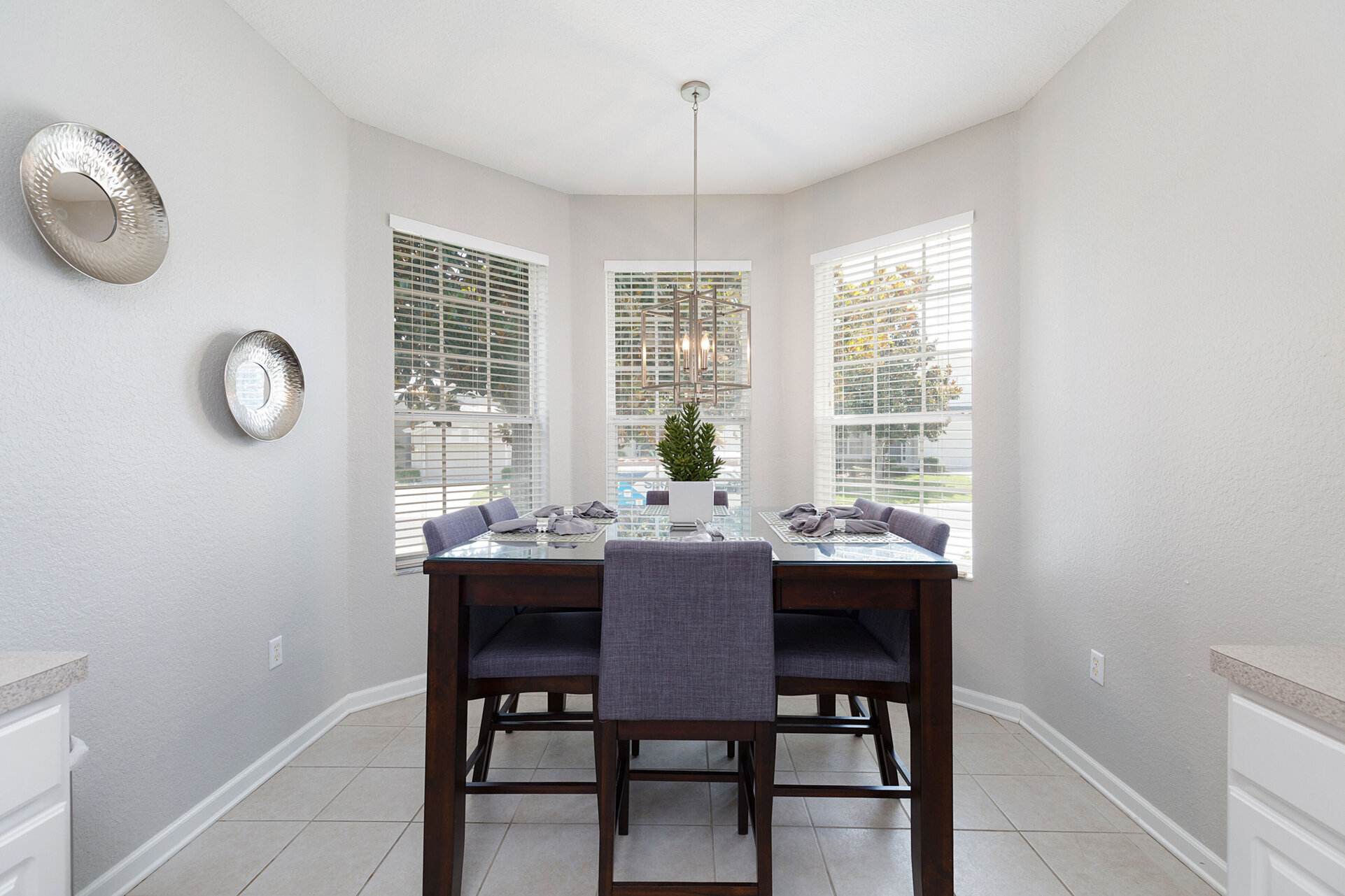 There is a kitchen nook with seating for 6