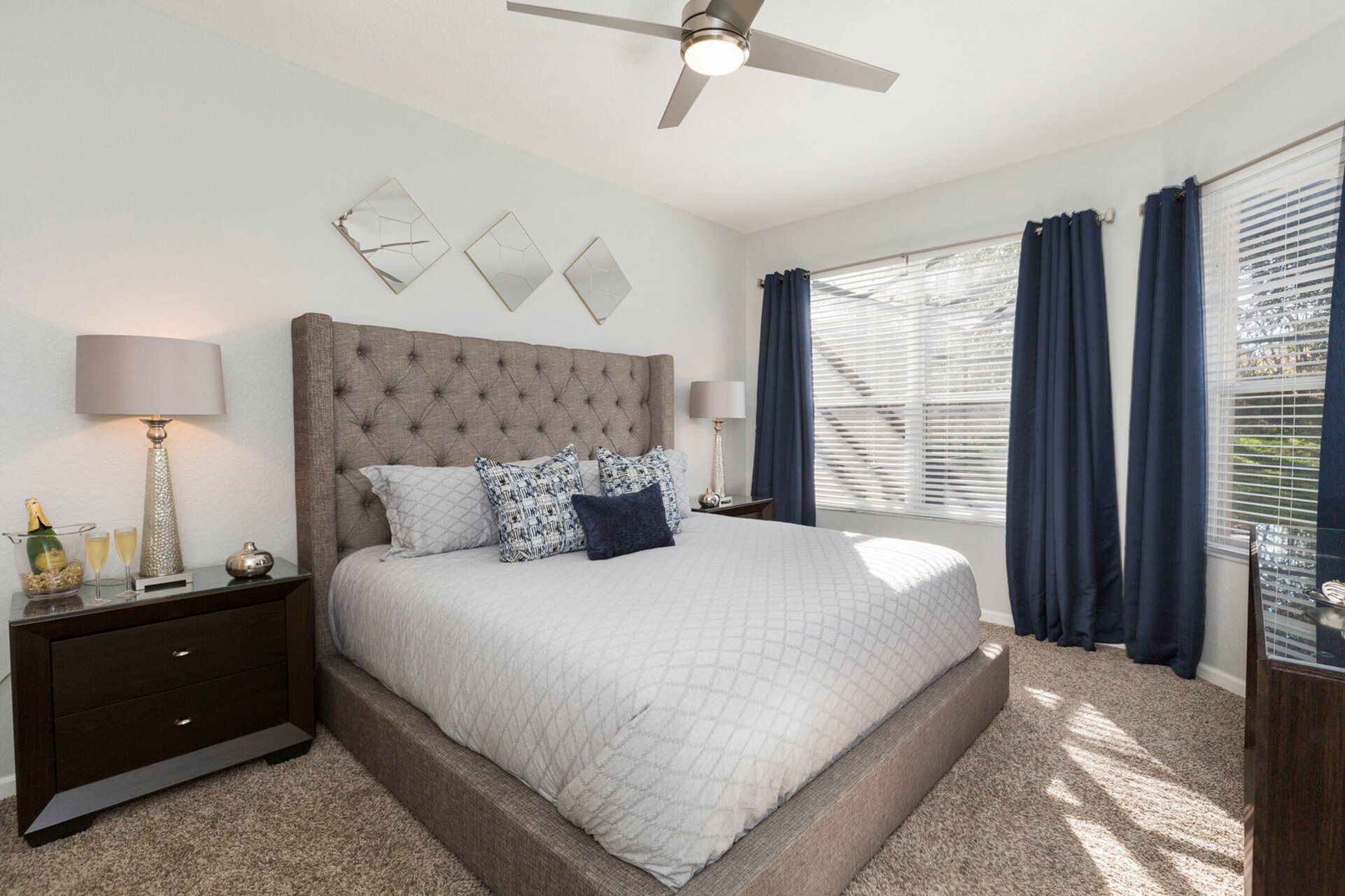 Master Suite 1 features a king bed, en-suite bathroom, and views to the pool area