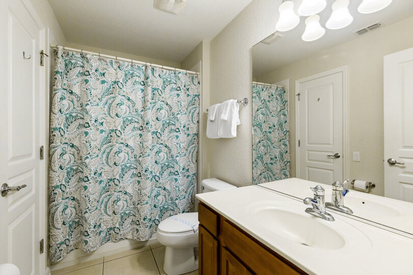 Bathroom connected to superhero themed bedroom