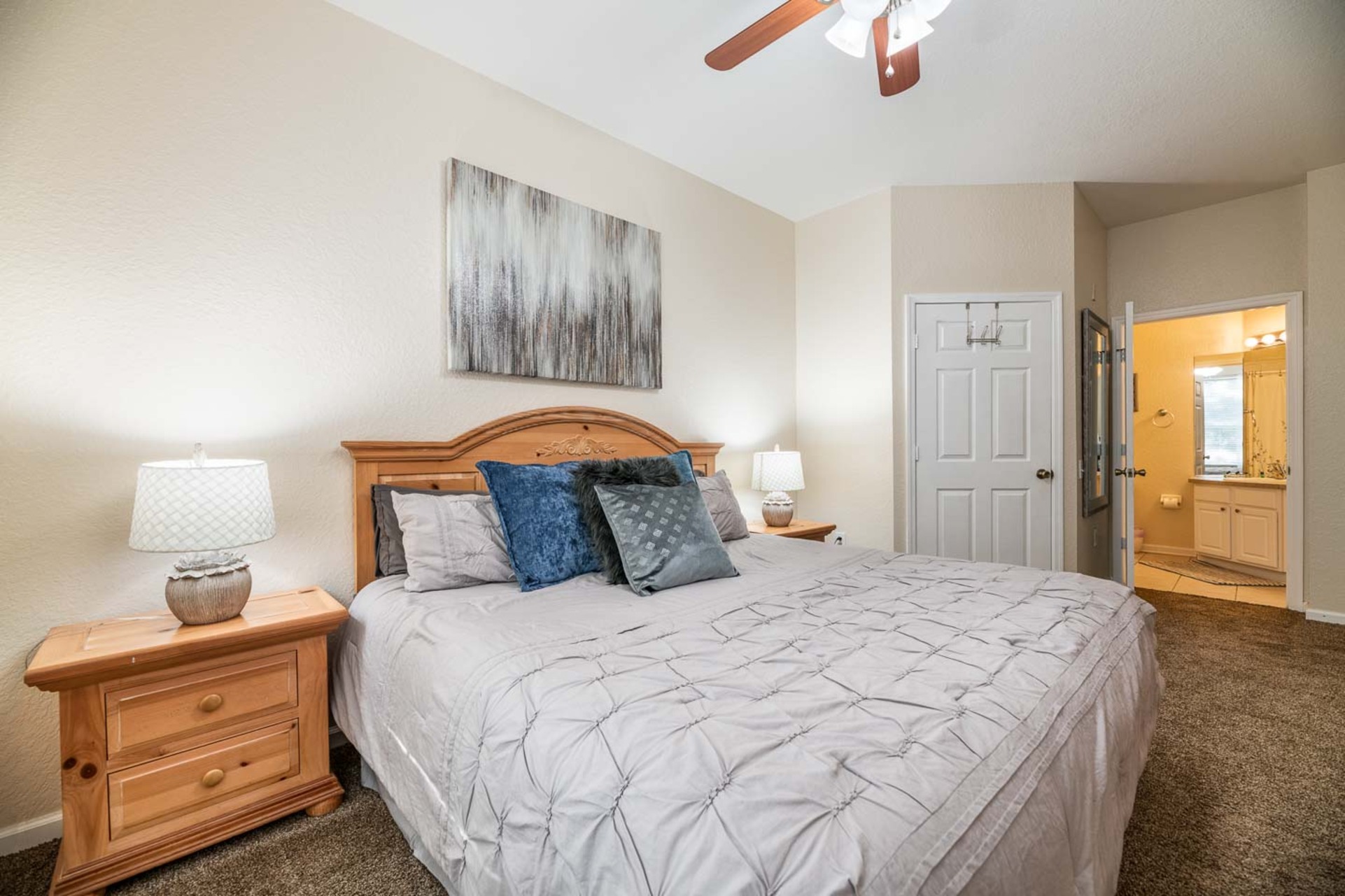 This bedroom includes an en suite with shower