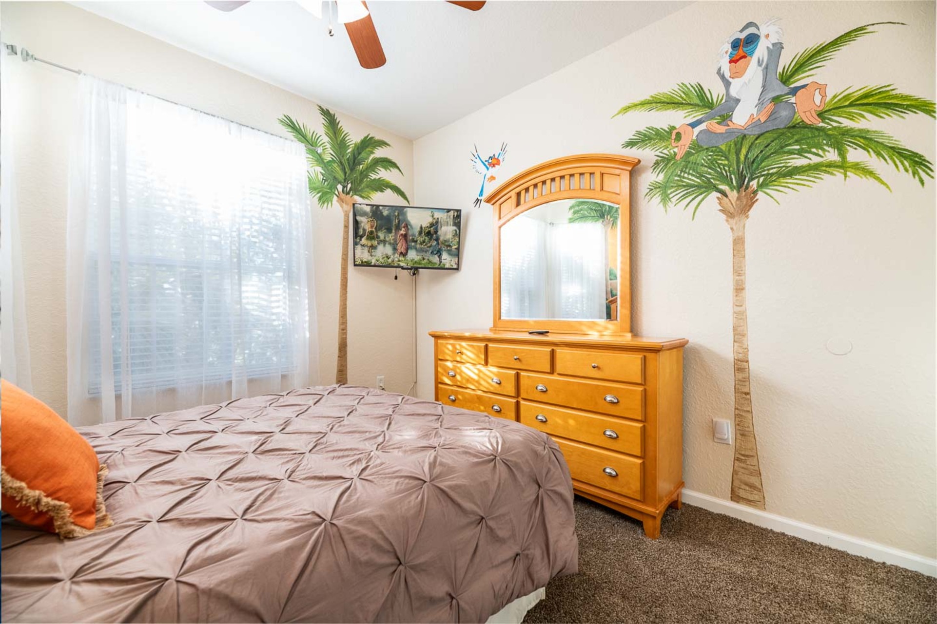 This bedroom features a queen-sized bed