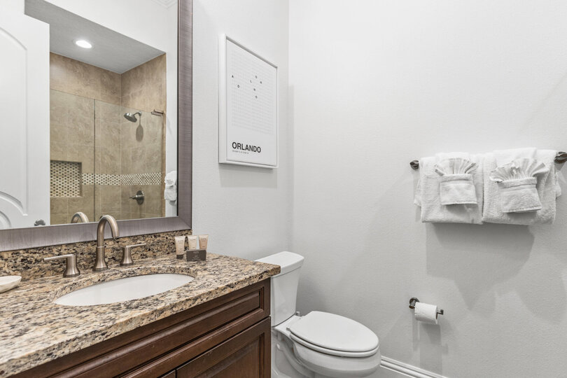 En-suite bathroom with glass door walk-in shower