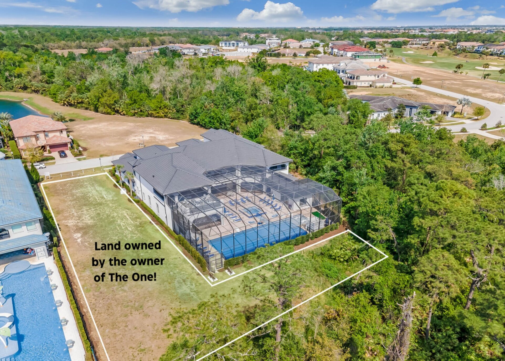 The open lot next door is owned by the owner of this home; The One!