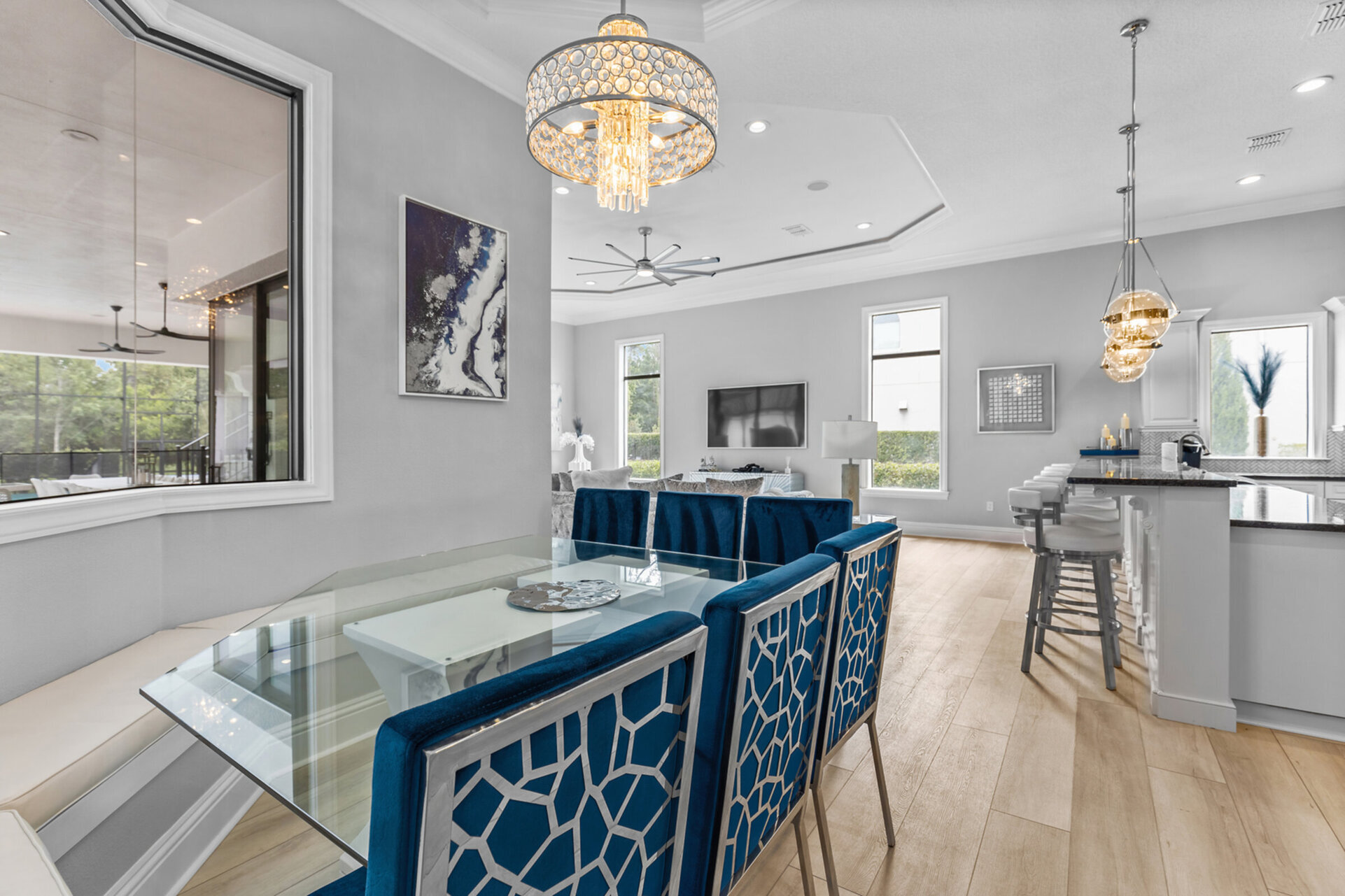 A kitchen nook to enjoy any meal with bench and dining chair seating for 12