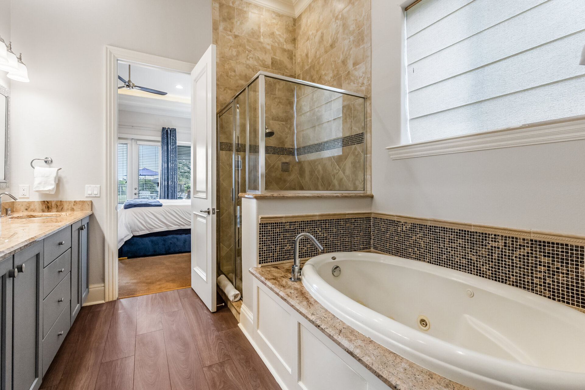 This bedroom comes with a private bathtub.