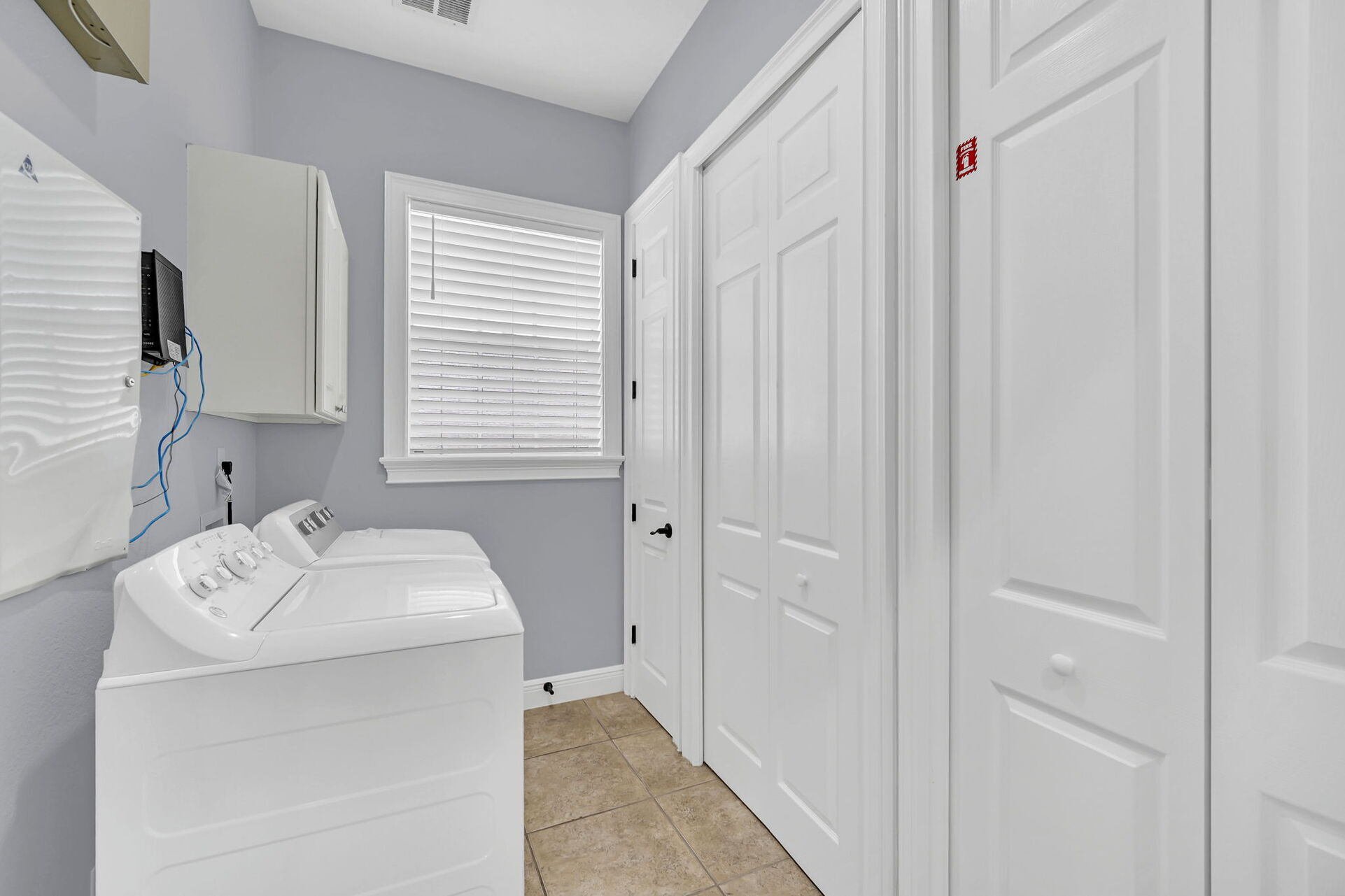 The in-unit washer and dryer located in the main house