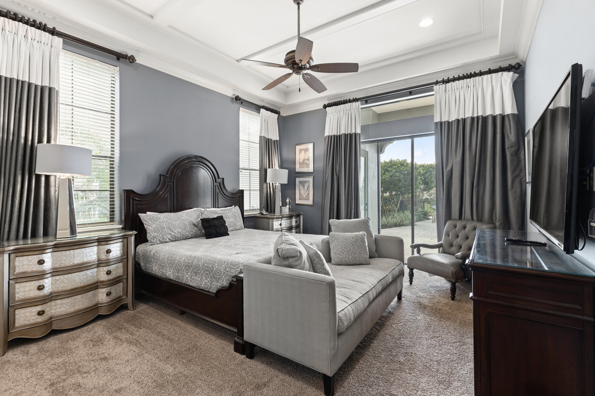 Ground floor master suite with sliding glass doors out to the patio