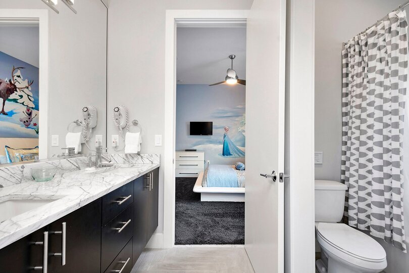Bedroom 4 and 5 will share a full bathroom with marble dual vanity and shower/tub combo