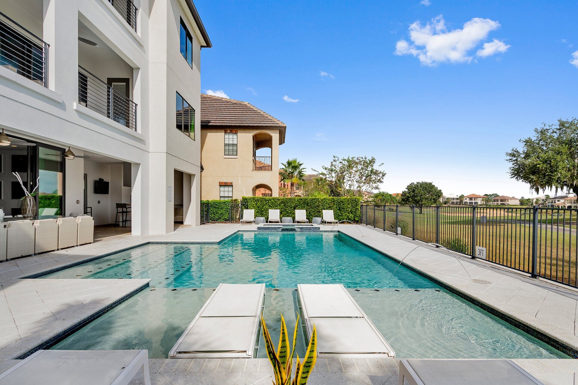 Relax in the pool and spillover spa