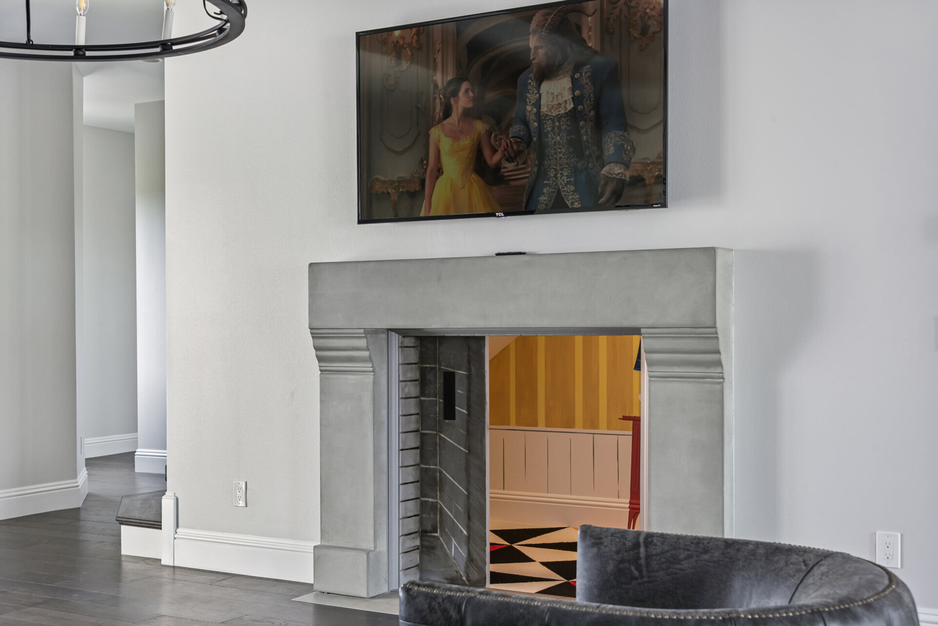The fireplace is actually a Secret Passage to Mouse Manor