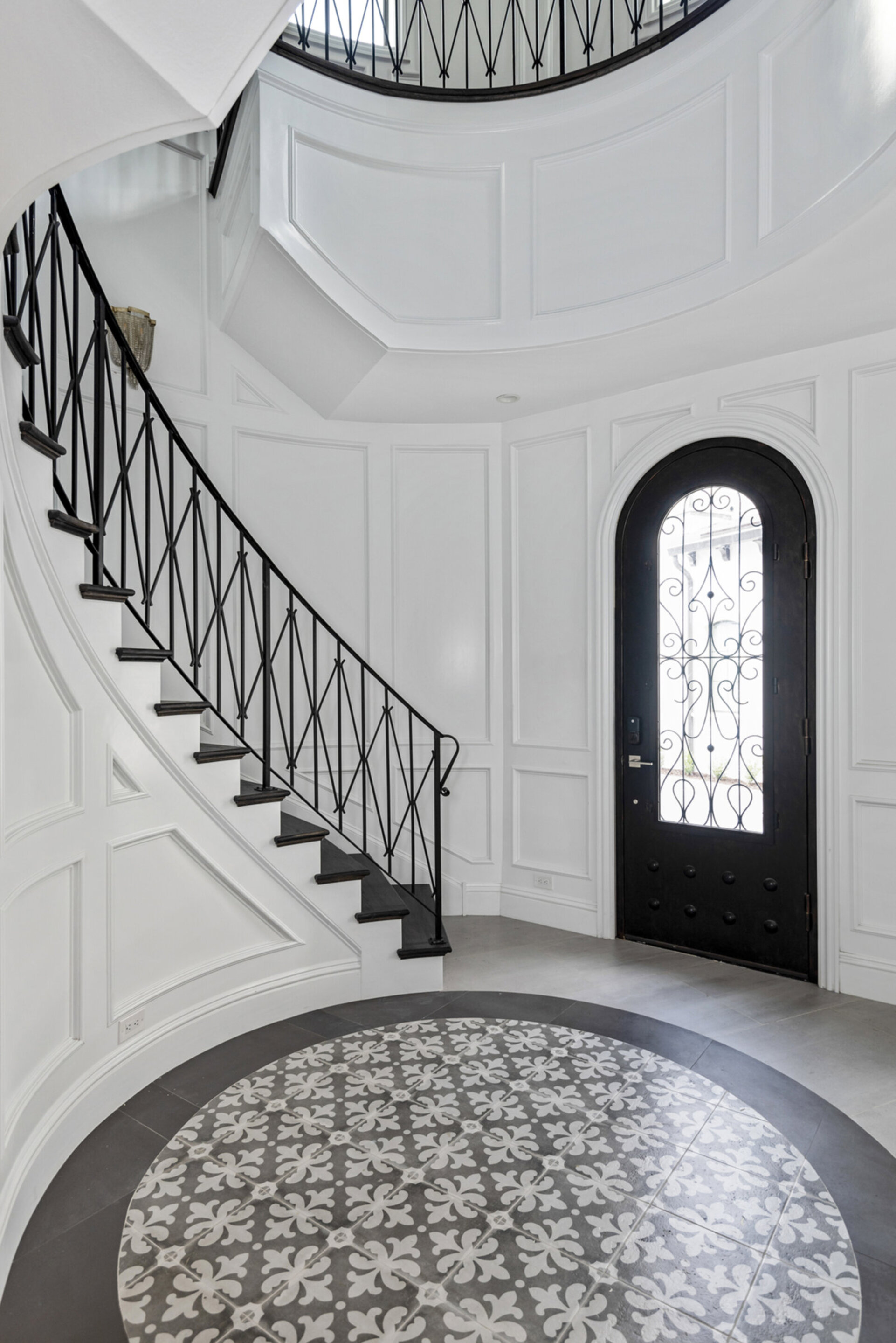The best place to make a royal entrance to the Chateau featuring a spiral staircase