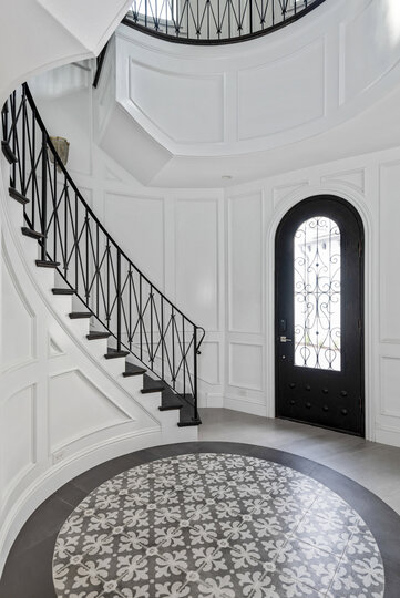 The best place to make a royal entrance to the Chateau featuring a spiral staircase