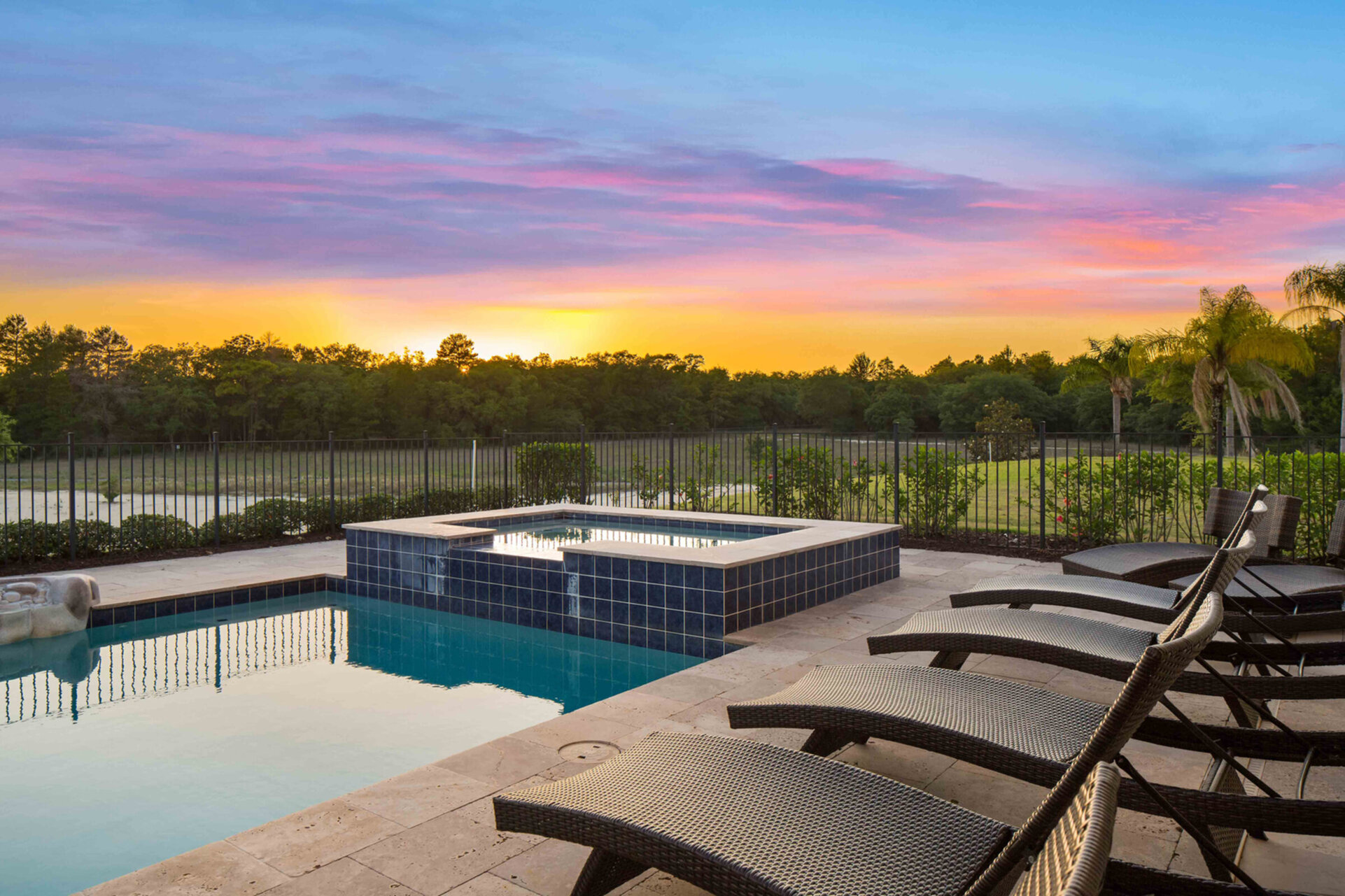 Spillover spa and plenty of loungers to relax in