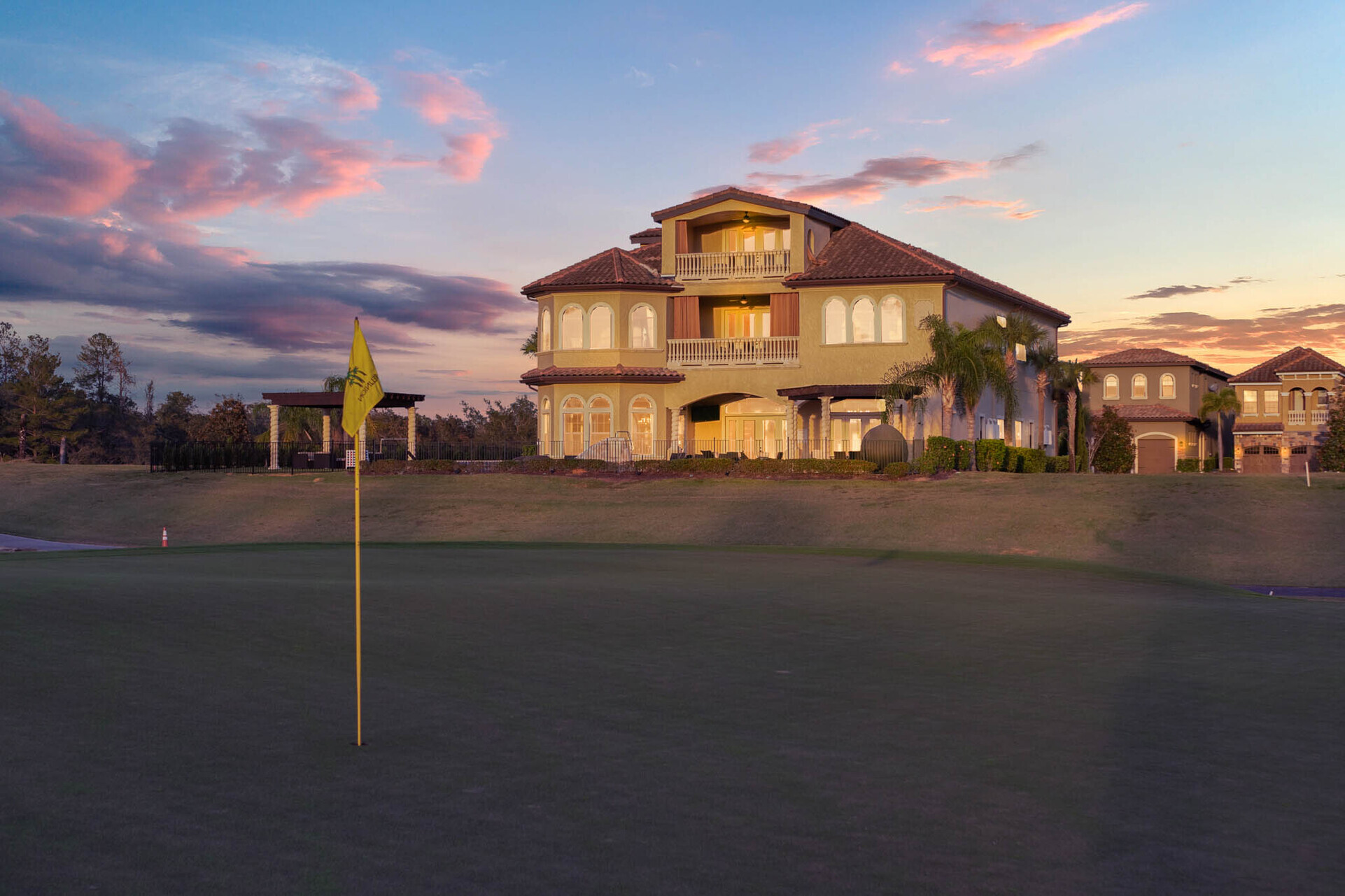 The view of the home from the 8th hole of the Jack Nicklaus Signature Golf Course