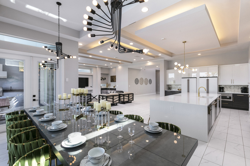 Seating for up to 12 guests under the custom-designed lighting
