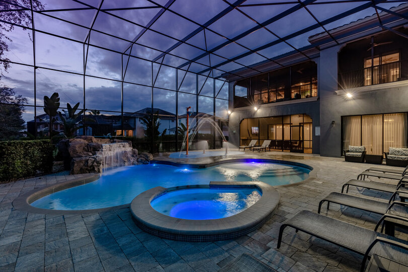 The pool lighting creates an extraordinary atmosphere for a night swim