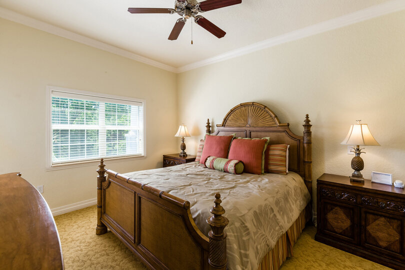 Master suite has a luxurious king size bed