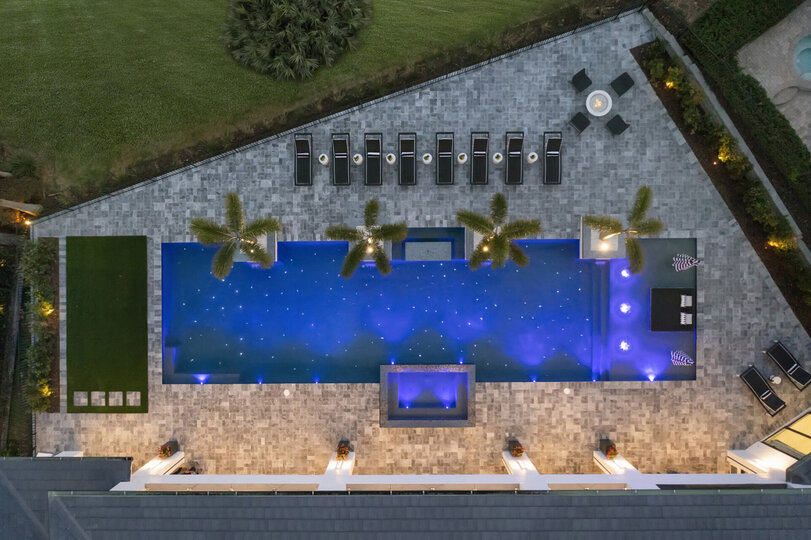 Spend your days and nights sitting by the pool and enjoying the spillover spa