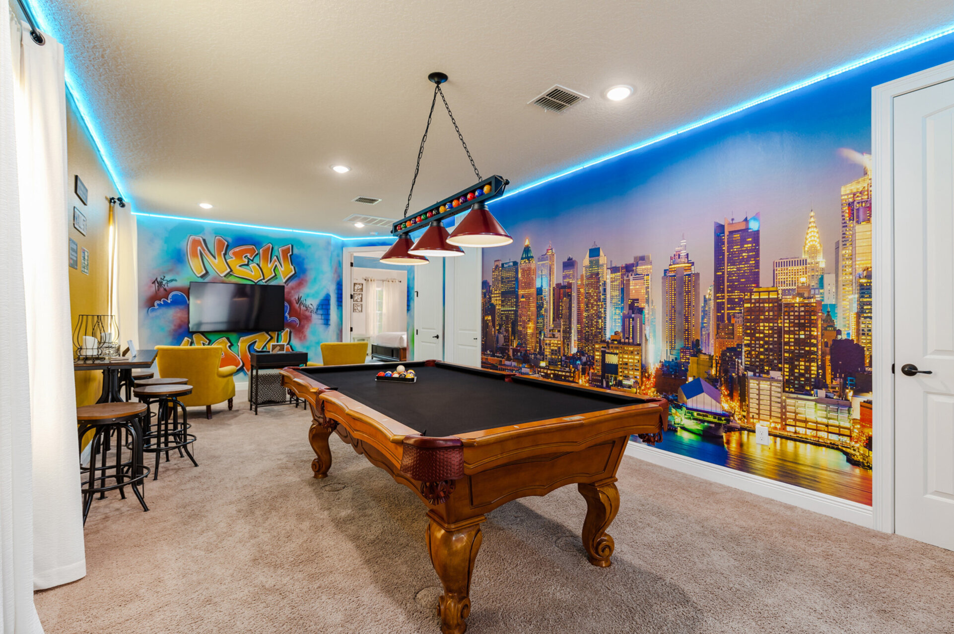 Play a round of pool with friends or family in the custom NY themed loft.