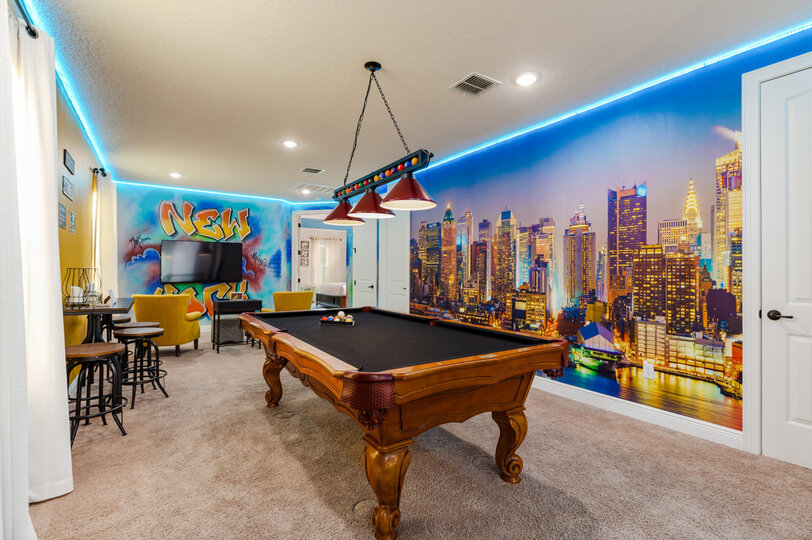 Play a round of pool with friends or family in the custom NY themed loft.
