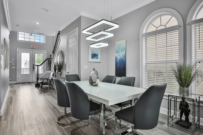 The formal dining table comfortably seats 8