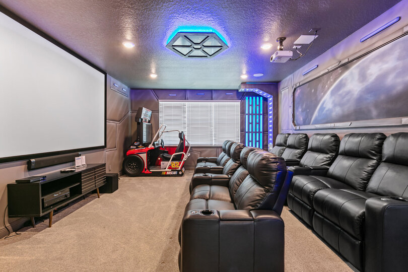 This home has its own theater room with arcades!
