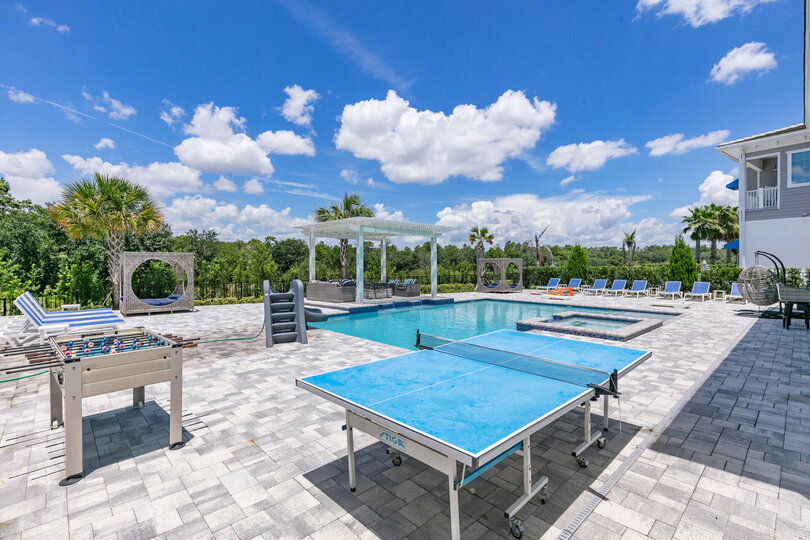 Enjoy a game of foosball or ping pong by the pool