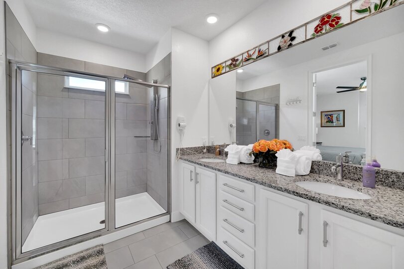 The en-suite includes a walk in shower.