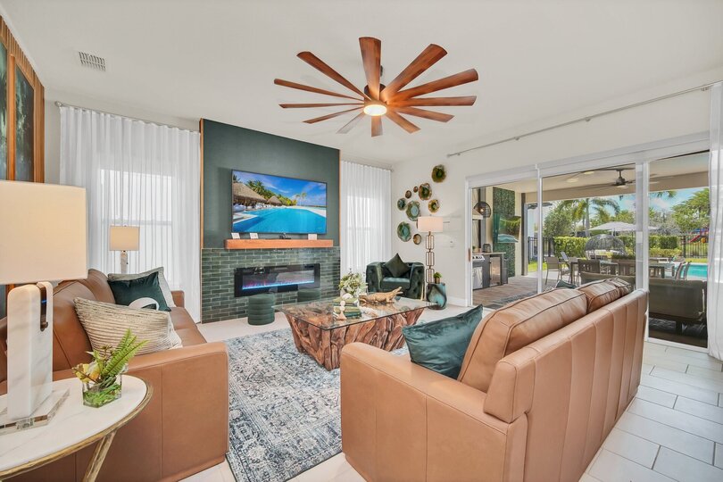 Gather in the spacious living room, designed with comfort in mind and ideal for entertaining guests or enjoying family time