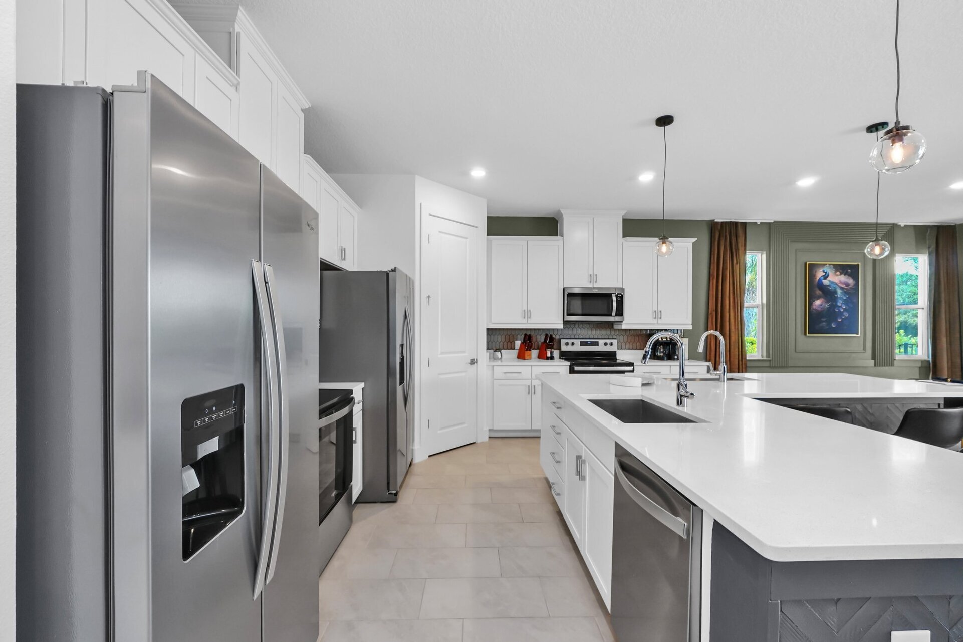 The home features 2 fridge/freezers and 2 dishwashers for convenience.