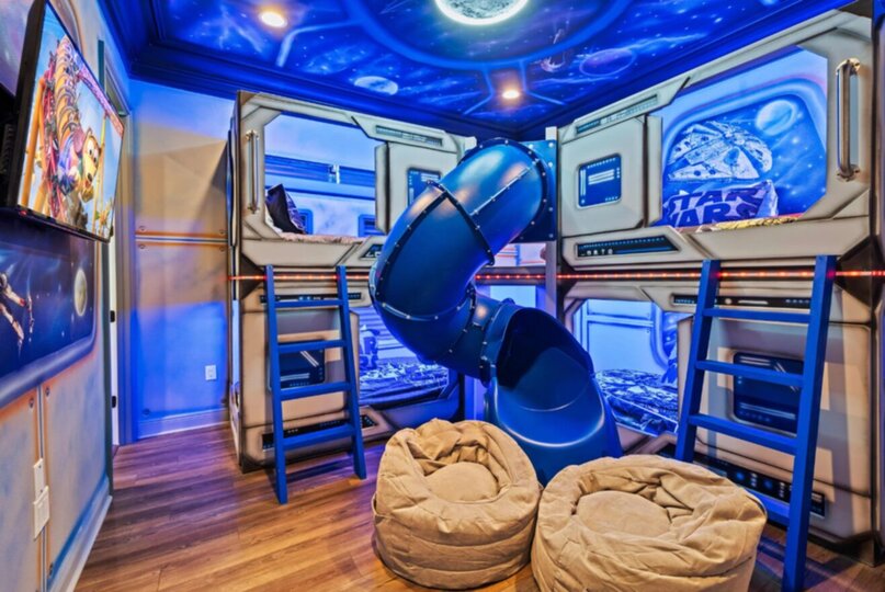 Play all day in this custom galaxy game room.