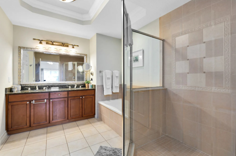 Enjoy the convenience of an en-suite bathroom featuring a walk-in shower for a refreshing start to your day