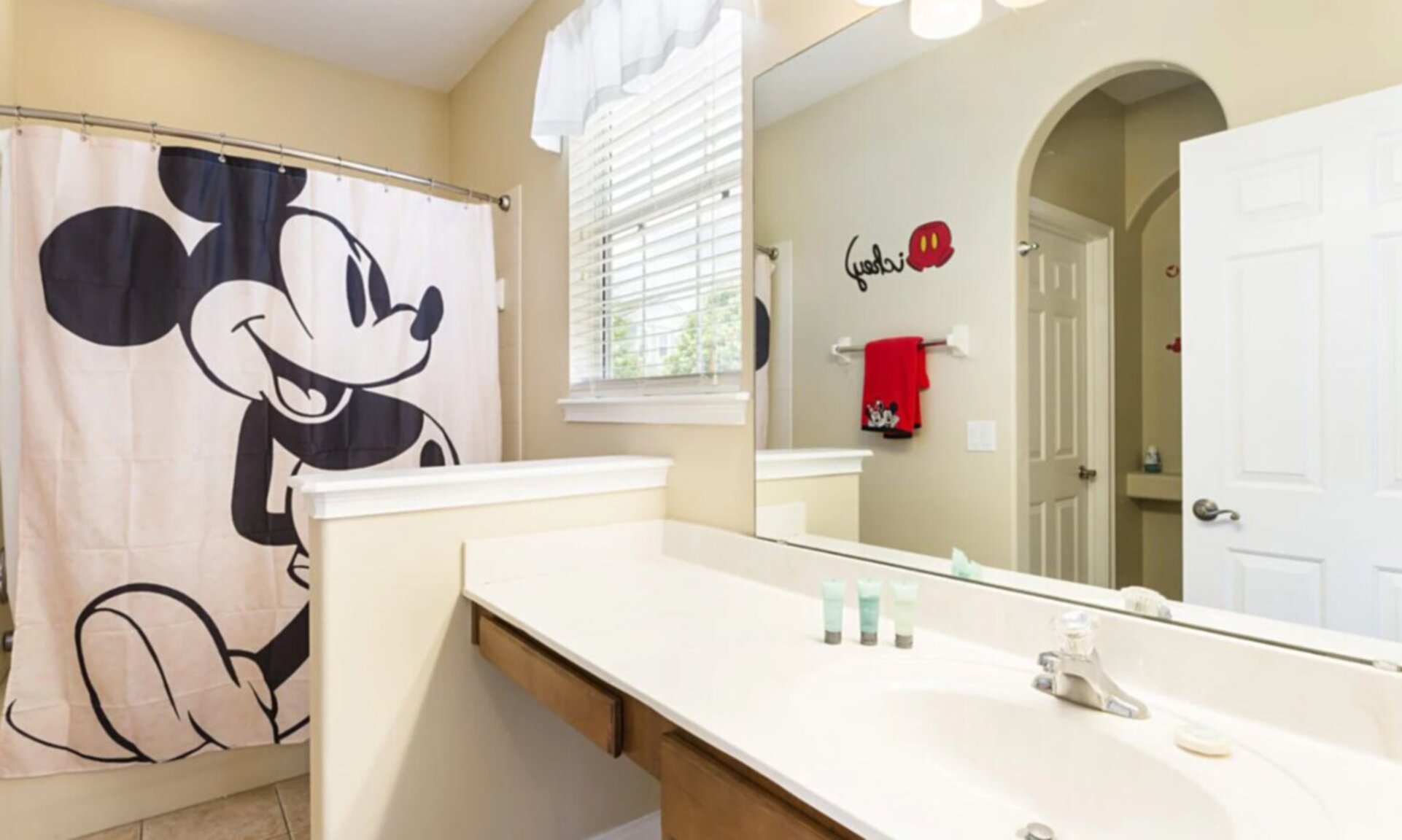 Enjoy the convenience of an en-suite bathroom featuring a walk-in shower for a refreshing start to your day