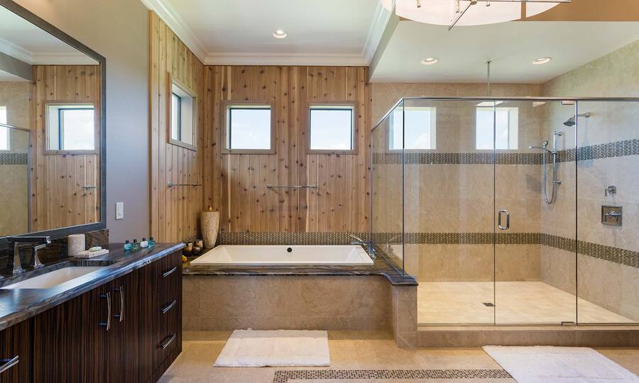 Unwind in the luxurious bath tub, offering a perfect retreat for a relaxing soak at the end of the day