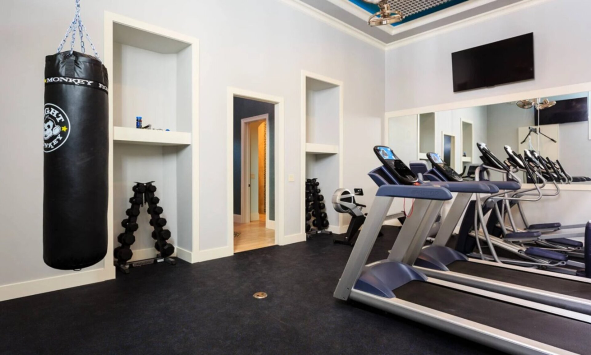 Enjoy a morning workout This home features its own private gym