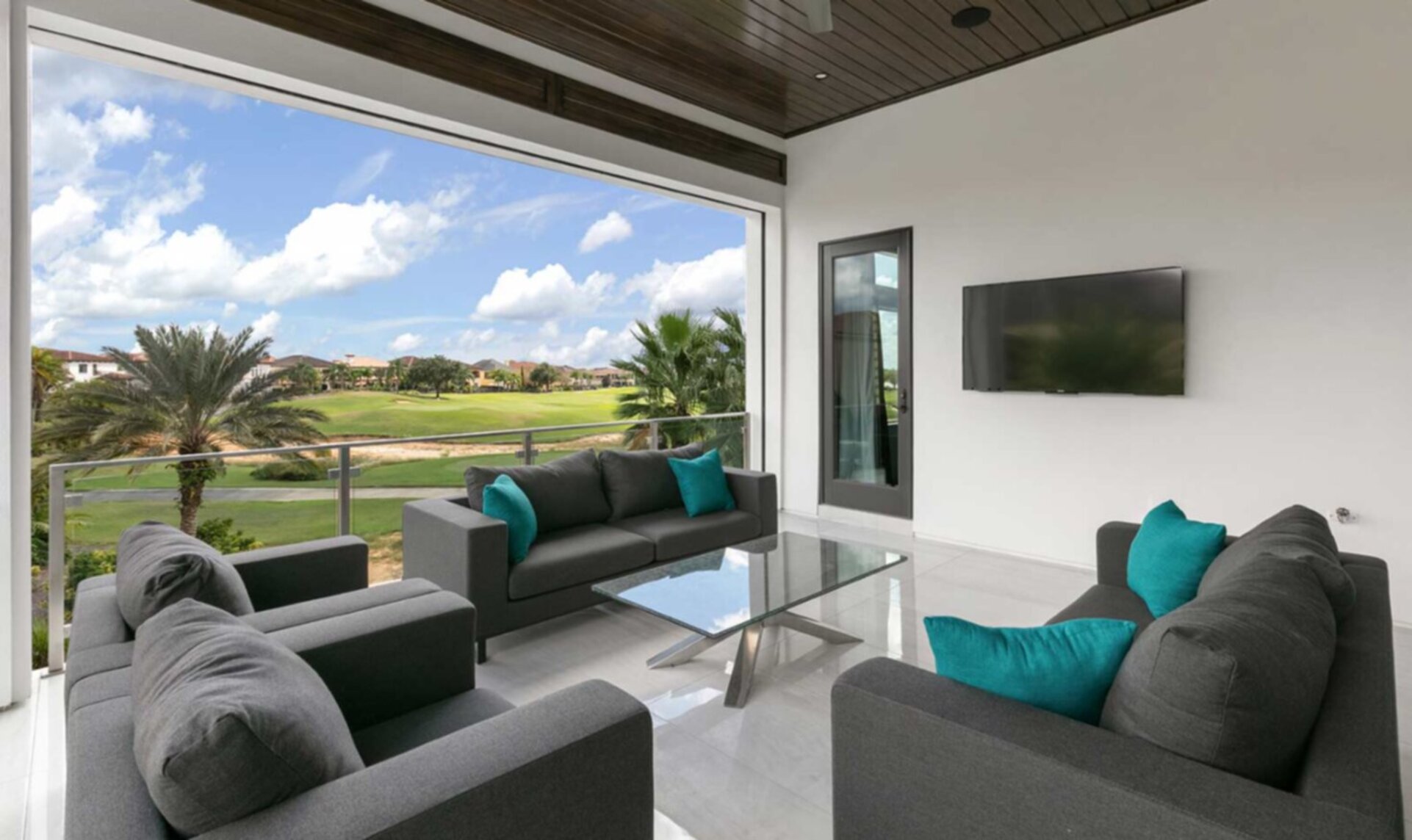 Covered Balcony Overlooking Golf Course and Pool