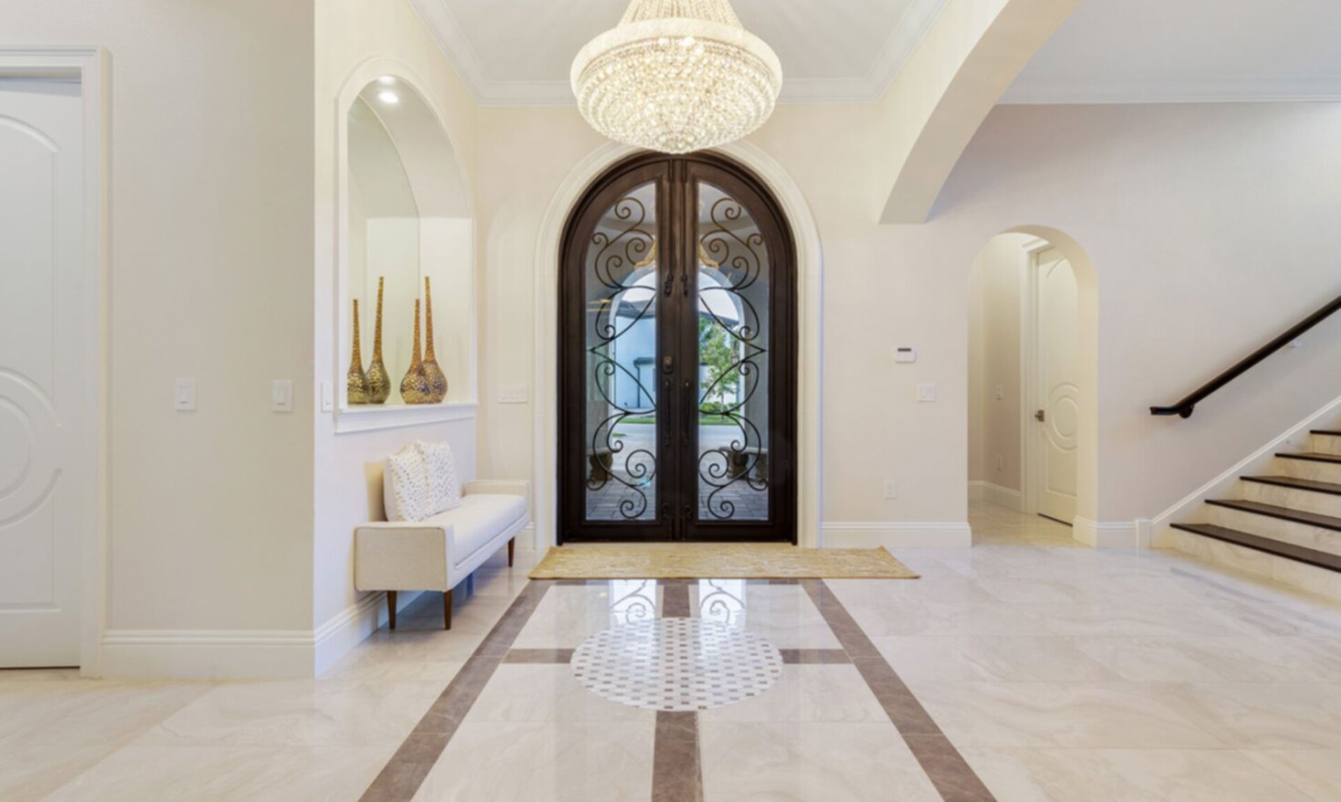 The front entrance to the home showcases the luxury of this magical villa