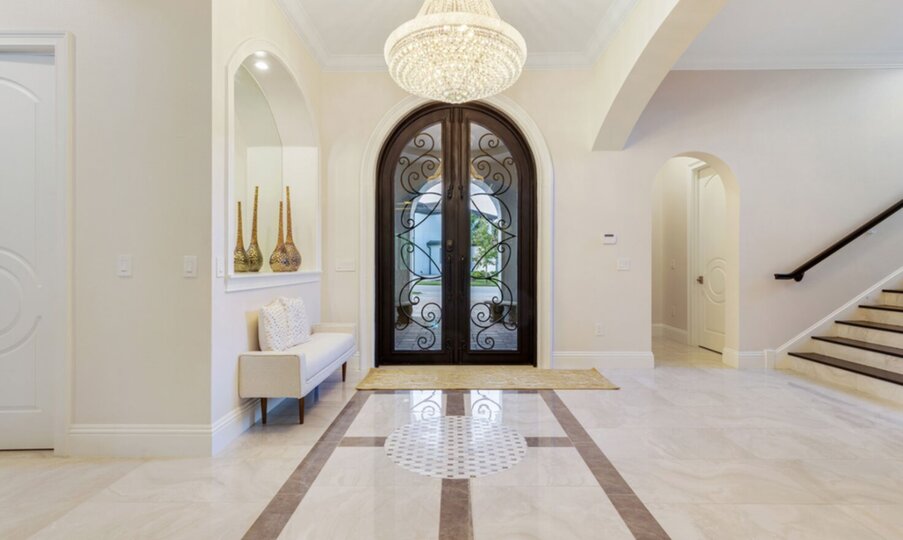 The front entrance to the home showcases the luxury of this magical villa