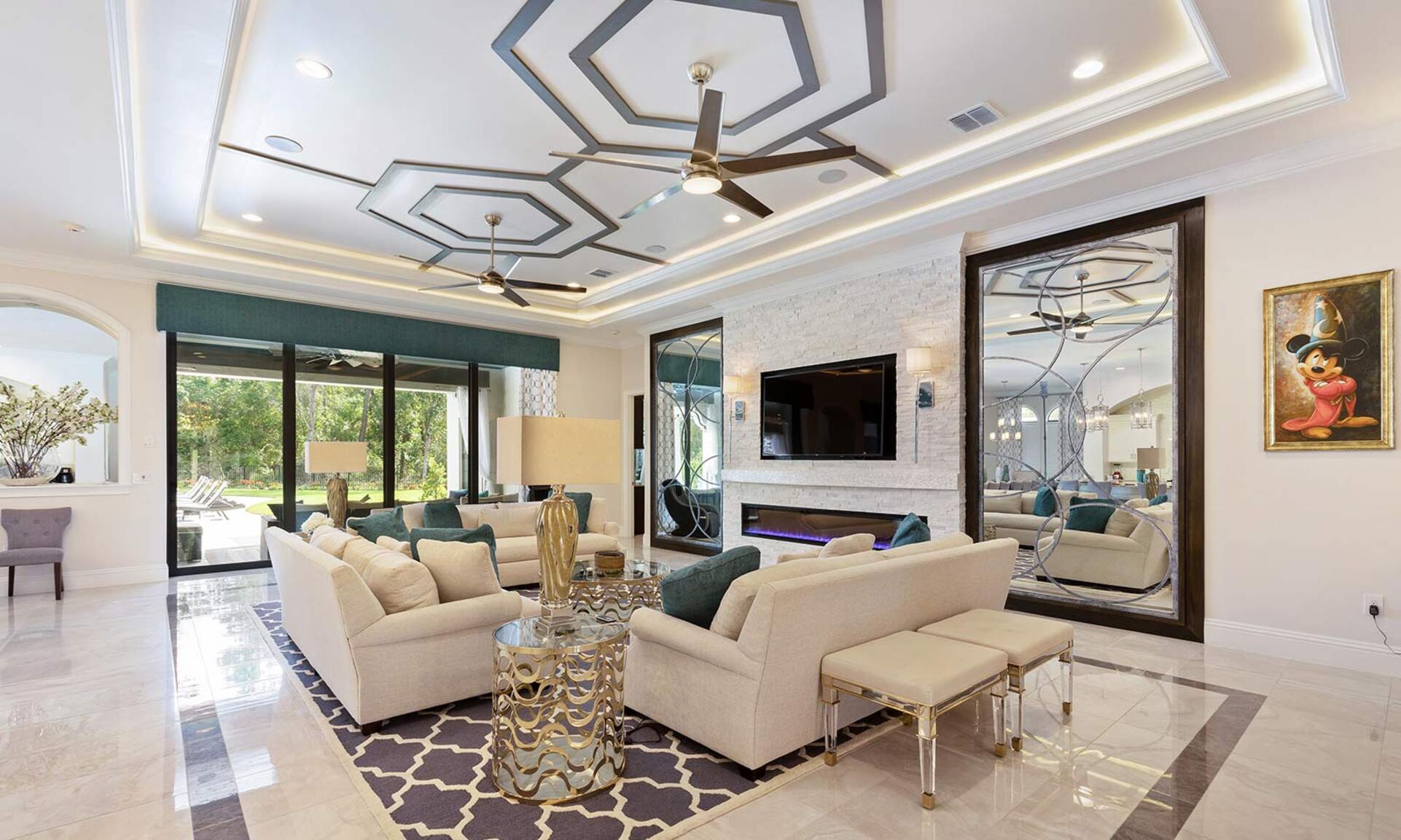 This modern themed living area features a fantastic open concept floorplan perfect for the larger group vacations