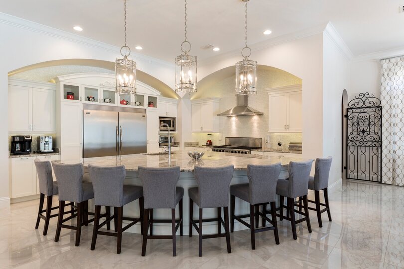 Sit down at the bar top whilst the family cooks up some home cooked meals