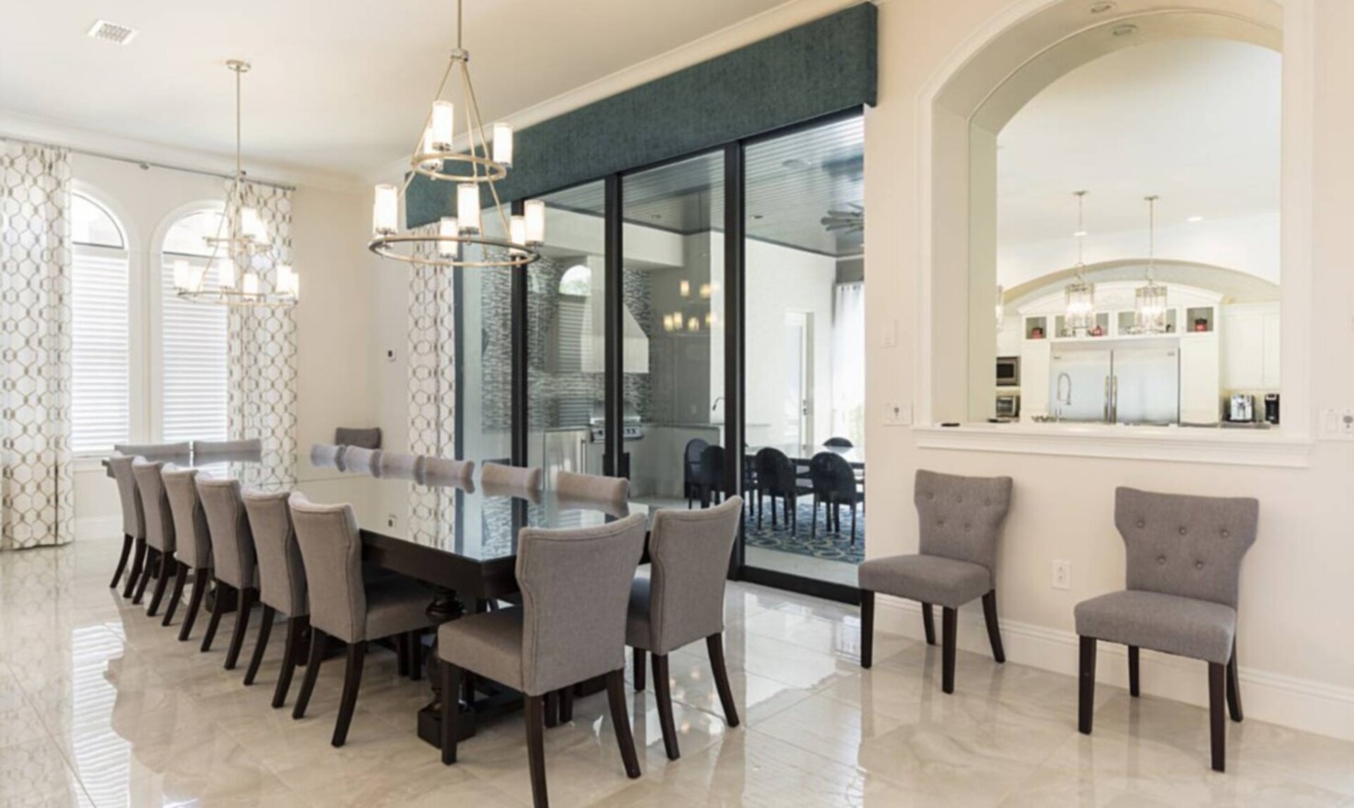 Dine in style at the formal dining table, which comfortably seats 16 guests for any occasion