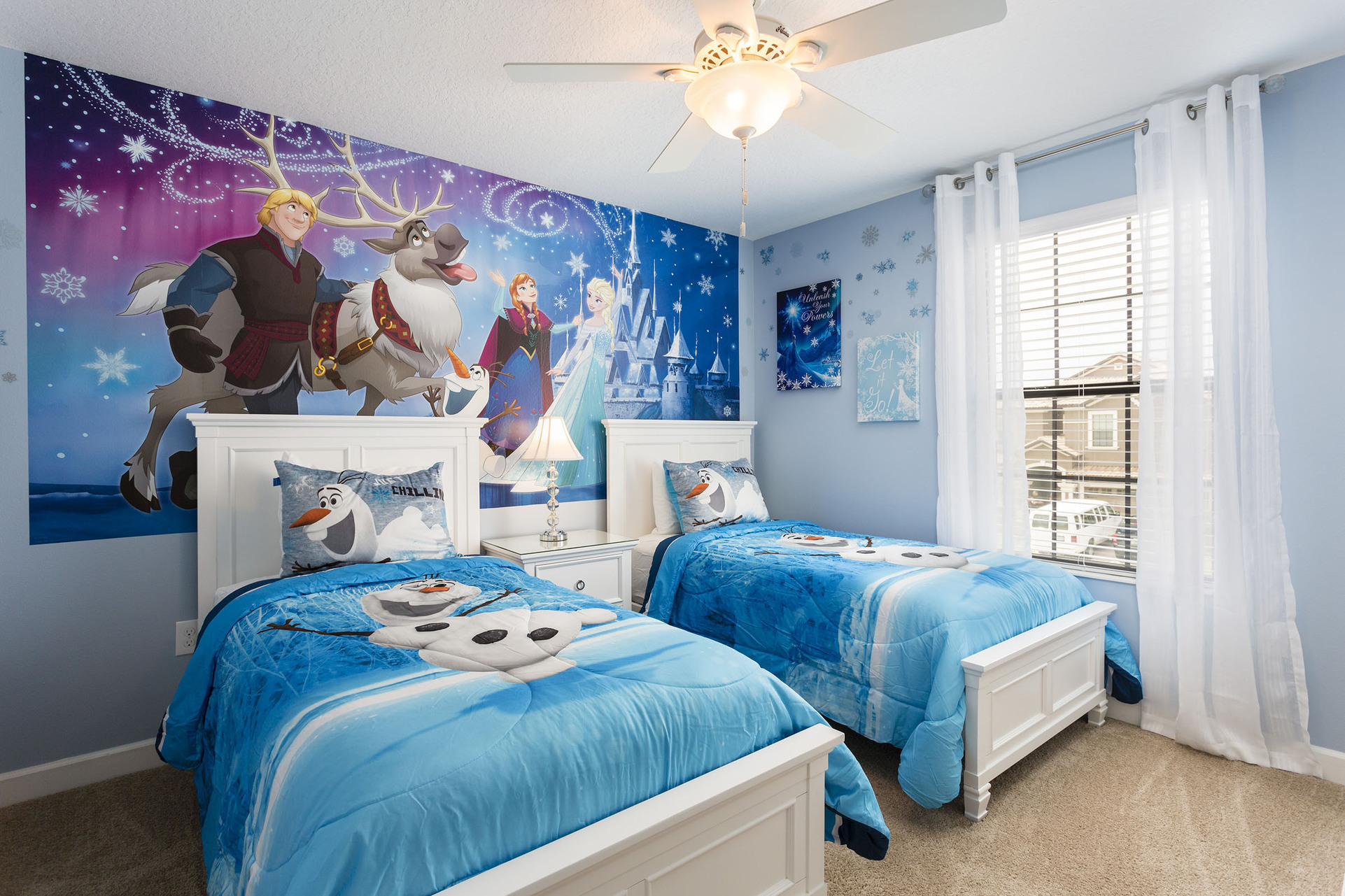 Every little princess will sleep easy in this bedroom with two twin beds