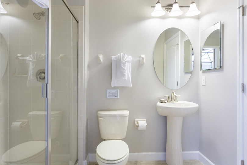 This bathroom features easy access to the pool area