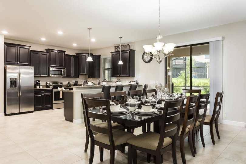 The open kitchen and dining area is great for spending time together on vacation