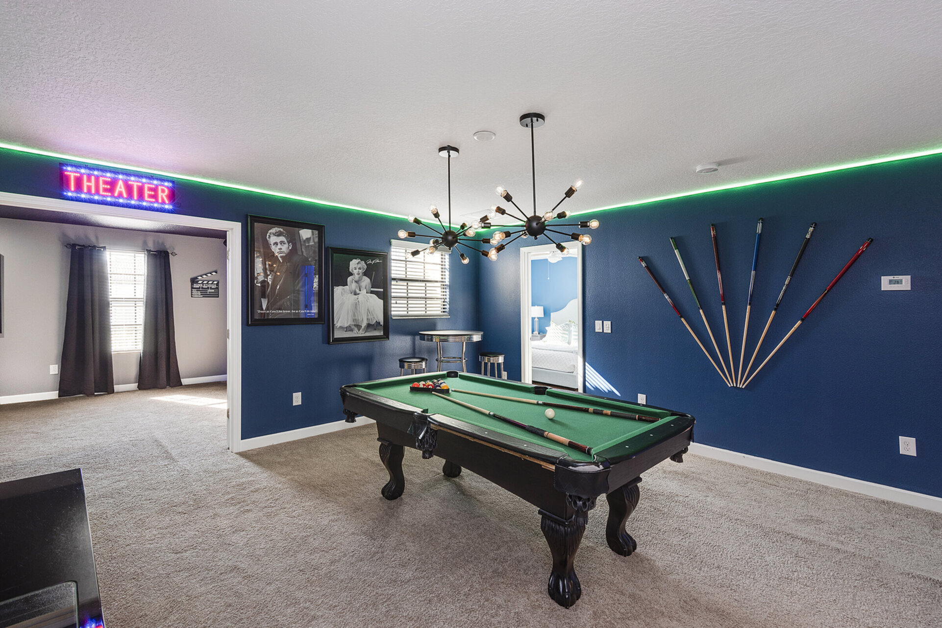 This loft area game room has access to the theater room as well