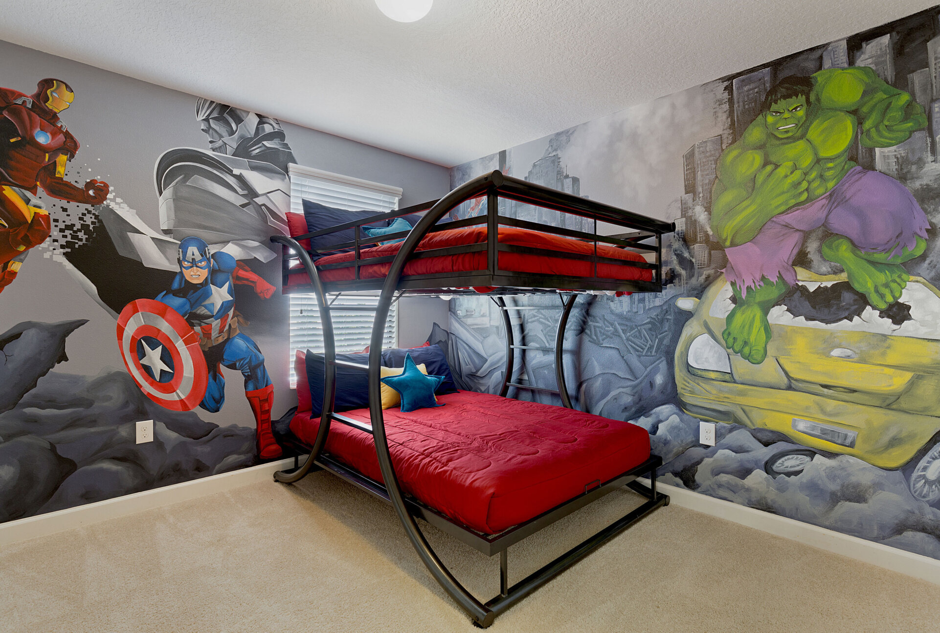 Kids can hang out with their favorite superheroes in this daring kids room